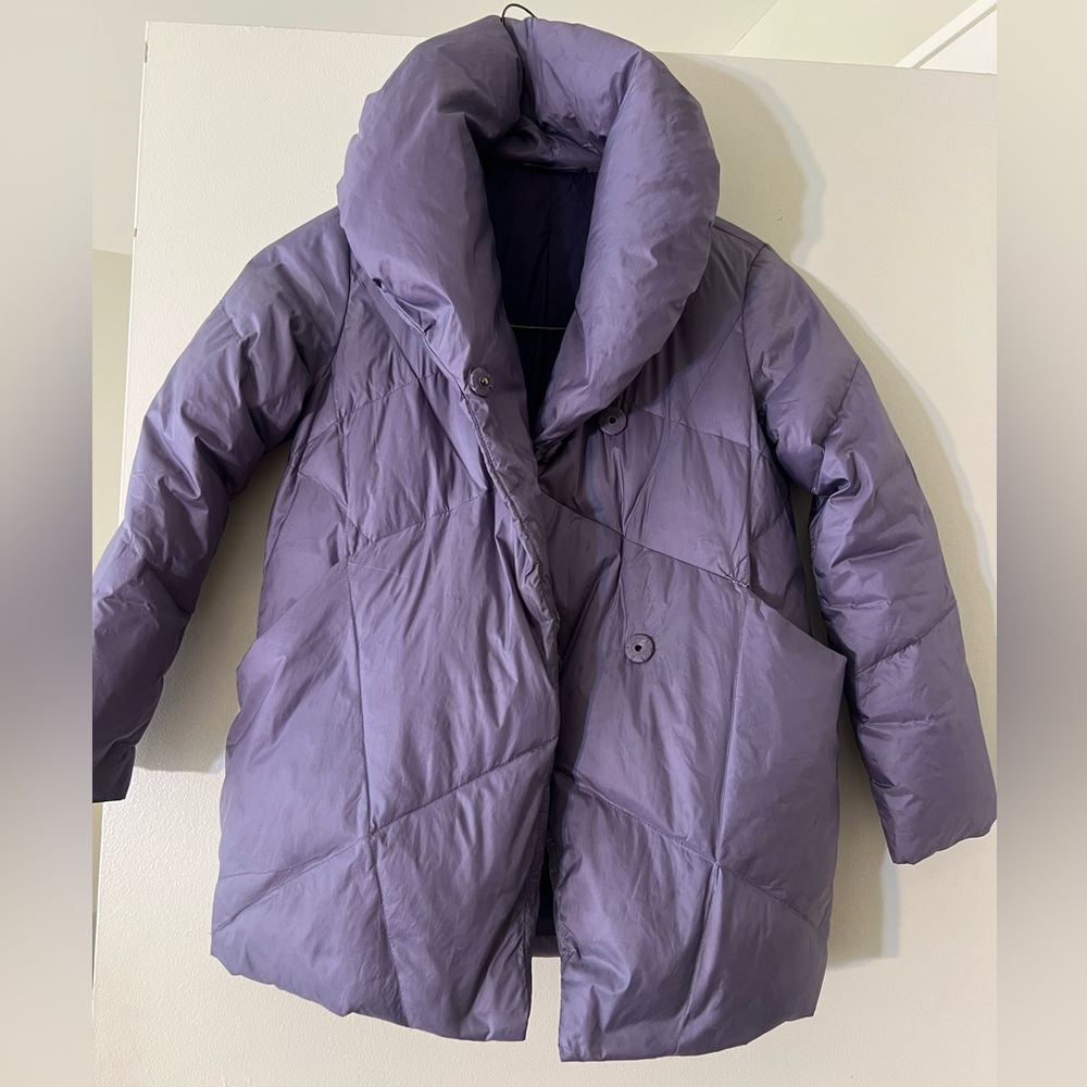 Lavender down jacket with high collar and double breasted buttons.